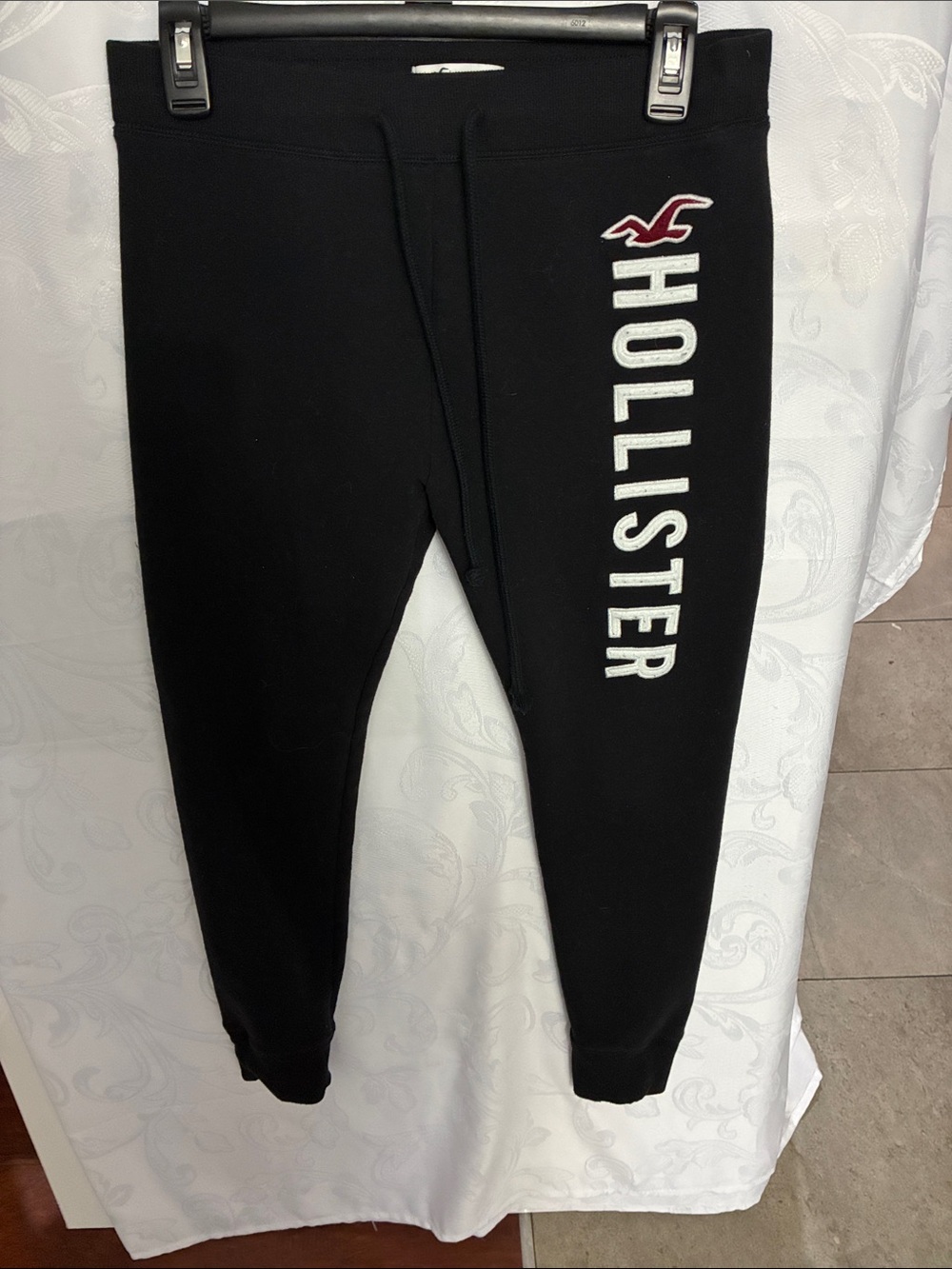 Hollister Black Jogger Sweatpants with White Logo and Red Accent